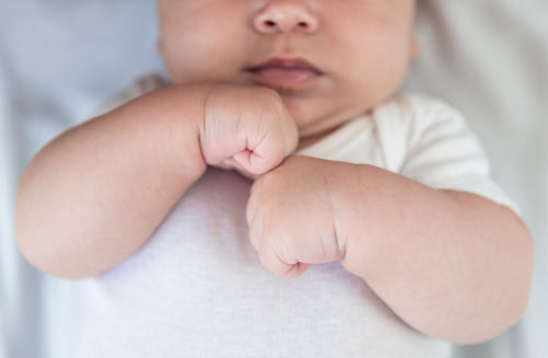 Why Pediatricians Check for Clenched Fists at Baby Visits
