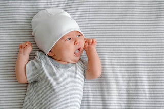 Infant showing of their rooting reflex