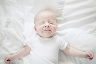 A baby sneezes