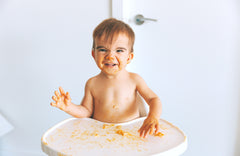Why Babies Throw Food—and What to Do About It