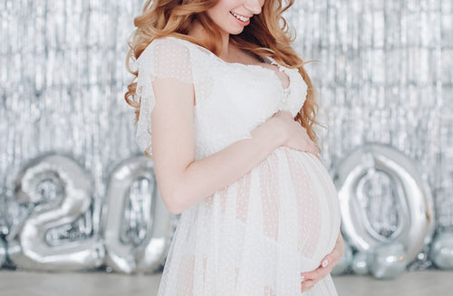 15 Celebratory New Year’s Pregnancy Announcement Ideas