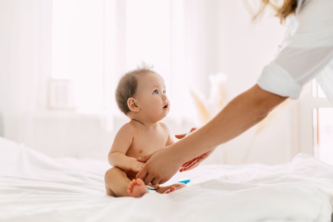 When do babies sit up happiest baby
